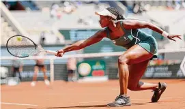  ?? Jean-Francois Badias/Associated Press ?? Sloane Stephens of the U.S. plays a shot against Karolina Pliskova of the Czech Republic during their first round match of the French Open Monday at the Roland Garros stadium in Paris.