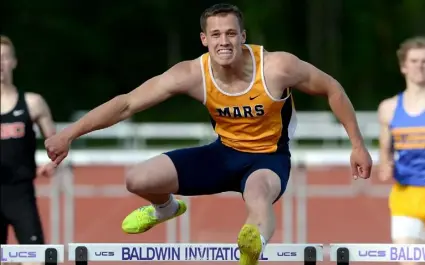  ?? Matt Freed/Post-Gazette ?? Mars Area's Ori Rinaman finished first in the Class AAA 300-meter hurdles at the WPIAL track championsh­ips and was a standout in football while earning the North Xtra Male Athlete of the Year.