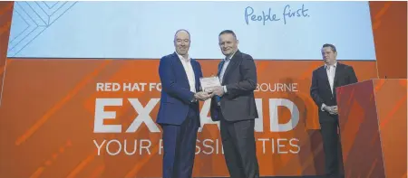  ?? Picture: Contribbut­ed ?? GENIUS REWARDED: Heritage Bank chief informatio­n officer Wayne Marchant (pictured centre) receives awards from IT solution provider Red Hat.