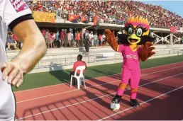  ??  ?? Best foot forward ... Under 20 FIFA Women’s World Cup action from the previous torunament two years ago (left); Susa, the mascot for the PNG event, steps out in Port Moresby (above).