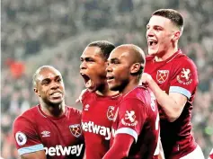  ??  ?? West Ham's Issa Diop celebrates scoring their second goal with Angelo Ogbonna, Declan Rice and Michail Antonio at the London Stadium. — Reuters photo