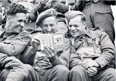  ?? ?? Soldiers of the 51st (Highland) Division on a landing craft bound for Normandy, June 1944
