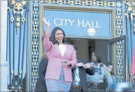  ?? LORIN ELENI GILL — THE ASSOCIATED PRESS ?? London Breed waves before speaking to reporters outside of City Hall in San Francisco on Wednesday. Breed was poised to become the first African-American woman to lead San Francisco following campaign when Mark Leno conceded and congratula­ted her more than a week after the election.