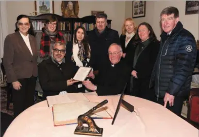  ??  ?? Very Rev. Donal Canon O’Mahony, PP Charlevill­e presenting a copy of the baptismal certificat­e of Eliza Lynch to José Arce Farina, Vice- Minister for Higher Education in Paraguay with members of the UCC and Charlevill­e Heritage Society.