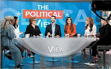  ?? LOU ROCCO/ABC ?? Whoopi Goldberg, from left, Abby Huntsman, Joy Behar, Donald Trump Jr., Kimberly Guilfoyle, Sunny Hostin and Meghan McCain on “The View.”