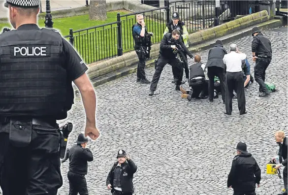  ??  ?? The Westminste­r attack, in which PC Keith Palmer was stabbed to death by Khalid Masood, has reopened the long-running debate about arming our brave bobbies.