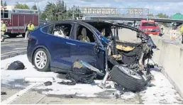  ?? AP FILE ?? In March, a Tesla Model X electric car crashed on Highway 101 in Mountain View, Calif., and burst into flames. The NTSB is also investigat­ing the fire.