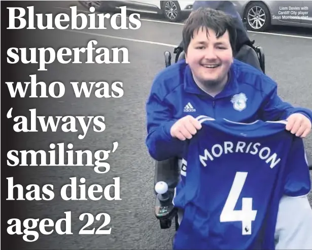  ??  ?? Liam Davies with Cardiff City player Sean Morrison’s shirt