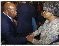  ?? (Democrat-Gazette file photo) ?? U.S. Rep. John Lewis (left) greets Elizabeth Eckford at Philander Smith College on Aug. 19, 2018.