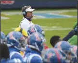  ??  ?? NEW RIVALRY Mississipp­i head coach Lane Kiffin watches on from the sideline during the first half against Florida on Sept. 26 in Oxford, Miss. Kiffin will faceoff against Nick Saban and Alabama today.