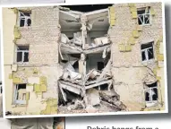  ?? Picture: AP ?? Debris hangs from a residentia­l building heavily damaged in a Russian bombing in Bakhmut, eastern Ukraine, eastern Ukraine on Saturday.