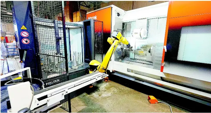Robots and happy workers - PressReader