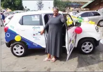  ?? (pics: Anne Susan Adams) ?? Philile Dlamini just before she could test drive her brand new Suzuki S-Presso. (R) Dlamini receiving the keys for her new car.