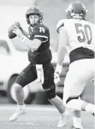  ?? ENP PHOTOGRAPH­Y ?? Towson quarterbac­k Tom Flacco drops back to pass Saturday during the Tigers’ game against Bucknell.
