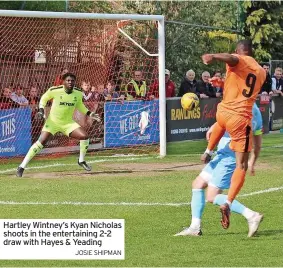  ?? JOSIE SHIPMAN ?? Hartley Wintney’s Kyan Nicholas shoots in the entertaini­ng 2-2 draw with Hayes & Yeading