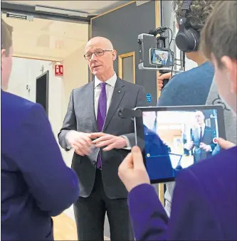  ??  ?? Education Minister John Swinney at Bertha Park High, Perth, last January