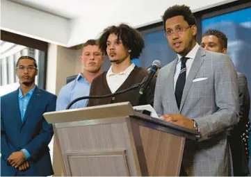  ?? BRIAN CASSELLA/CHICAGO TRIBUNE ?? Former Northweste­rn football player Lloyd Yates, right, speaks July 19 alongside fellow former players Warren Miles Long, from left, Tom Carnifax and Simba Short about the hazing they say occurred in the program.