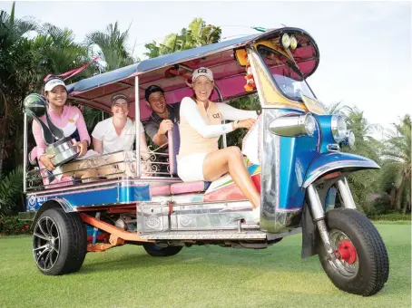  ?? Golf Saudi ?? Team Hillier celebrate their Aramco Team Series — Bangkok win in a traditiona­l Thai tuktuk on Friday. Tournament ends with Saturday’s individual final round.