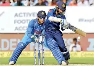  ??  ?? Sri Lankan batsman Upul Tharanga plays a shot during the third One Day Internatio­nal (ODI)