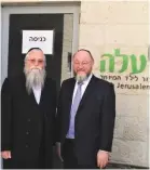  ?? (Courtesy) ?? UK CHIEF RABBI Ephraim Mirvis is greeted by Rabbi Yehuda Marmorstei­n, directorge­neral of the ALEH centers, outside ALEH Jerusalem.