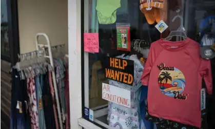  ?? ?? A help wanted sign on a storefront in Ocean City, New Jersey on 18 August 2023. Photograph: Bloomberg/Getty Images