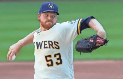  ?? MARK HOFFMAN / MILWAUKEE JOURNAL SENTINEL ?? Brandon Woodruff is lined up to pitch the season opener on July 24.