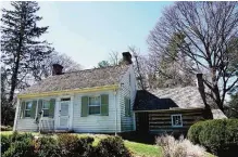  ??  ?? Photo shows the log cabin structure which was originally used as a kitchen, next to the plantation house at Josiah Henson Park in Bethesda, Maryland.