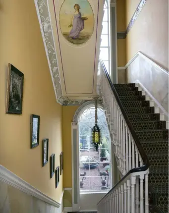  ??  ?? TOP RIGHT: The magnificen­t staircase is full of light courtesy of the many windows, which were mainly original when Desiree bought the house 45 years ago.