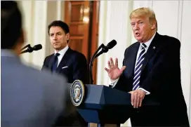  ?? MARK WILSON / GETTY IMAGES ?? President Donald Trump and Italian Prime Minister Giuseppe Conte hold a joint news conference Monday at the White House. Among the topics discussed were immigratio­n, trade and NATO. Trump also reiterated his vow to shut down the government if he does...