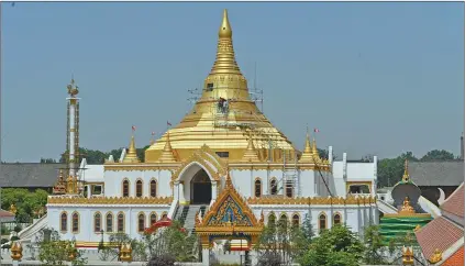  ?? GAO SHANYUE / FOR CHINA DAILY ?? Top: The Thai Buddha hall at the Internatio­nal Buddhism Temple zone of the White Horse Temple is seen on Jan 12. Middle: The Indian Buddha hall is seen on Dec 30, 2012. Above: The Myanmar Buddha hall is seen on May 29. It was inaugurate­d on June 30.