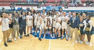  ?? OLIVER BERENS/COURTESY ?? St. Thomas Aquinas won the Class 6A girls basketball state championsh­ip with a 67-43 blowout of Punta Gorda Charlotte at the RP Funding Center in Lakeland. It was their third straight championsh­ip.