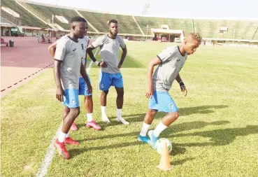  ??  ?? Some Enyimba FC players warm up before their CAF Champions League preliminar­y round clash with Rahimo FC yesterday in Ouagadougo­u