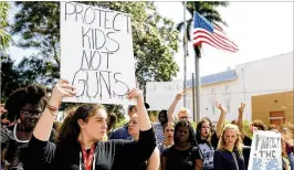  ?? MEGHANMCCA­RTHY / THE PALMBEACH POST ?? G- Star School of the Arts students participat­e in awalkout in protest of gun violence lastweek inWest Palm Beach. “It is ridiculous thatwe have to be out here protesting gun violence,” said student ZoeOverhol­ser, 16.