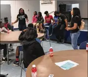  ??  ?? Angelina Jackson, now 17, is shown here talking to fifthgrade­rs who were about to transition to middle school, about the importance of making good decisions. Jackson mentors through the organizati­on “Quest for Change.”