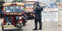  ??  ?? CHECKPOINT – A soldier mans a checkpoint after the plebiscite on the Bangsamoro Organic Law held in Jolo town, Sulu, January 22, 2019. (EPA)