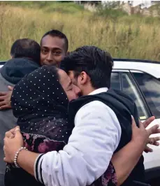  ?? ?? Abdul Mateen Khalid’s emotional reunion with his mother Basharat Khalid.