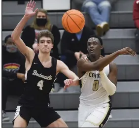  ?? (NWA Democrat-Gazette/Charlie Kaijo) ?? Little Rock Central’s Kyler Hudson (0) fires a pass by Bentonvill­e’s Caden Miller on Saturday during Central’s 57-50 victory in the semifinals of the Class 6A boys state tournament. More photos at arkansason­line.com/314boys6a/