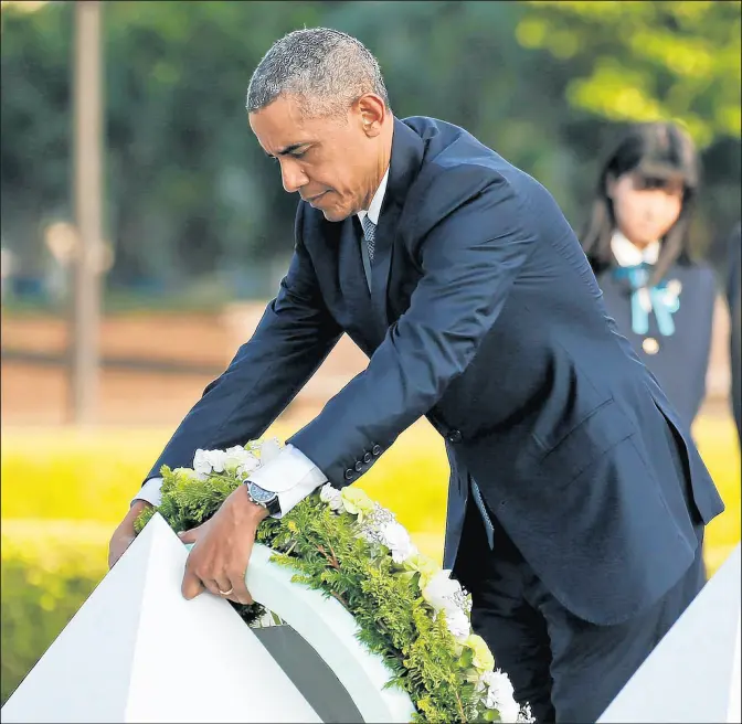  ?? SHUJI KAJIYAMA/AP ?? President Obama lays wreaths at the cenotaph at Hiroshima Peace Memorial Park in Hiroshima, western Japan in 2016.