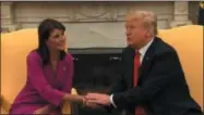  ?? THE ASSOCIATED PRESS ?? President Donald Trump says the U.S. Ambassador to the United Nations, Nikki Haley, will be leaving the administra­tion ‘at the end of the year.’ They met in the Oval Office, shortly after word came of her plans to resign.