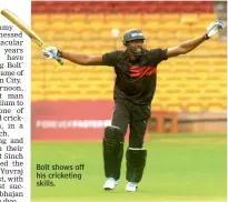  ??  ?? Bolt shows off his cricketing skills.