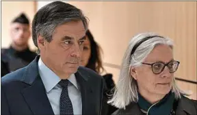  ??  ?? François et Penelope Fillon au tribunal correction­nel de Paris.