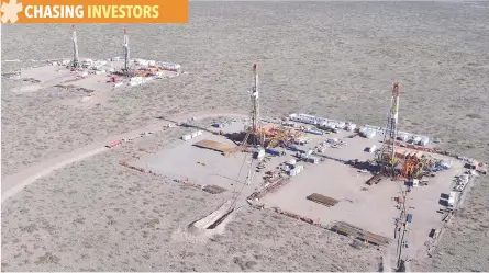  ?? — Reuters ?? Drilling rigs are seen in the Loma Campana Vaca Muerta shale oil and gas drilling site in the Patagonian province of Neuquen, Argentina.