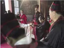  ??  ?? 3 3 Mark of respect: A student bows in front of Zhen to receive a certificat­e during a graduation ceremony at the campus of Hebei Academy of Fine Arts. – AFP photo 4 We did It: Students posed with their certificat­es in a circle to mark their special...