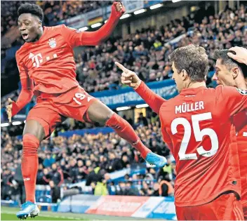  ??  ?? Flying high: Alphonso Davies celebrates after Bayern Munich’s second goal in their win against Chelsea