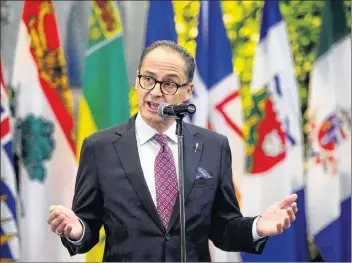  ?? CP PHOTO ?? Alberta Finance Minister Joe Ceci talks to reporters prior to a meeting with Finance Minister Bill Morneau and fellow provincial and territoria­l counterpar­ts in Ottawa on Monday.