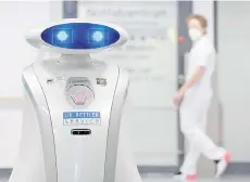  ?? — AFP photo ?? Cleaning robot ‘Franzi’ cleans in the entrance area of a hospital in Munich Neuperlach, southern Germany.