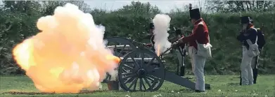  ?? BILL SAWCHUK
TORSTAR PHOTO ?? Re-enactors fire a cannon at Fort George Saturday.