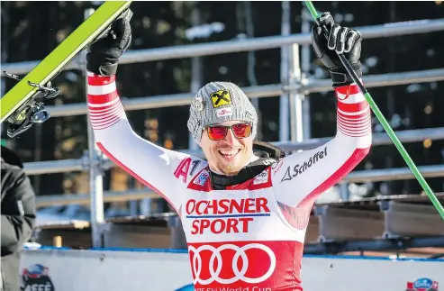  ?? — CP PHOTO ?? Austria’s Max Franz celebrates his win at the men’s World Cup downhill at Lake Louise on Saturday.