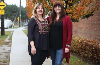  ?? AMAL AHMED ALBAZ/TORONTO STAR ?? Penny Barsoum, left, and Emily Portelles got Santa Claus Fund boxes in the ’60s. This year, they want to give back.