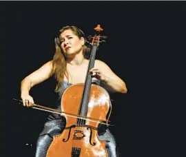 ?? Kevin Parry ?? CELLIST Alisa Weilerstei­n gets into the music while performing at the Wallis.